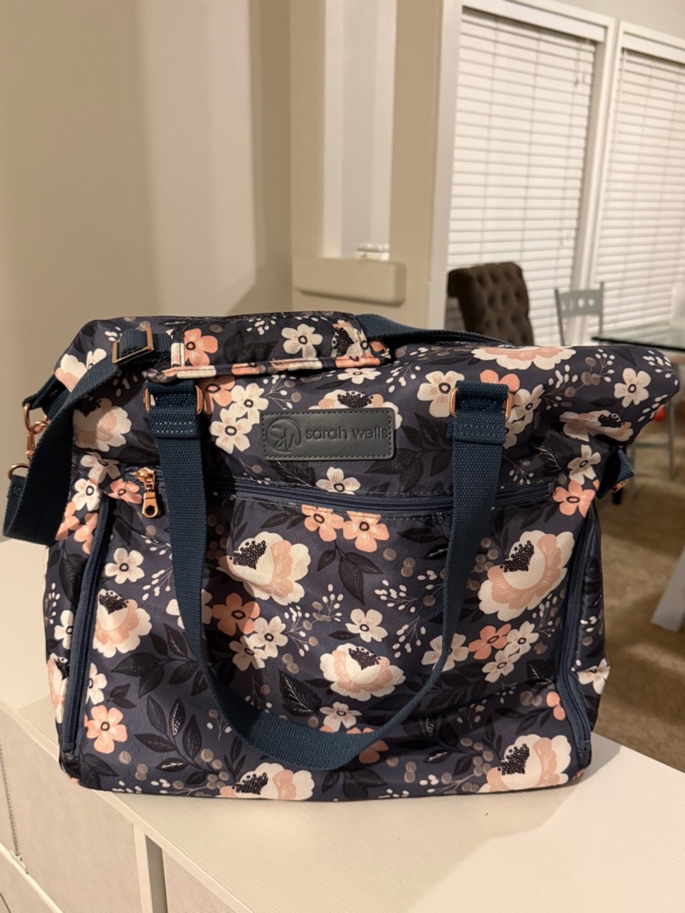 Sarah Wells Navy Floral Baby Bag with Peach Blooms